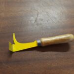 Rozpěrák s rukojetí